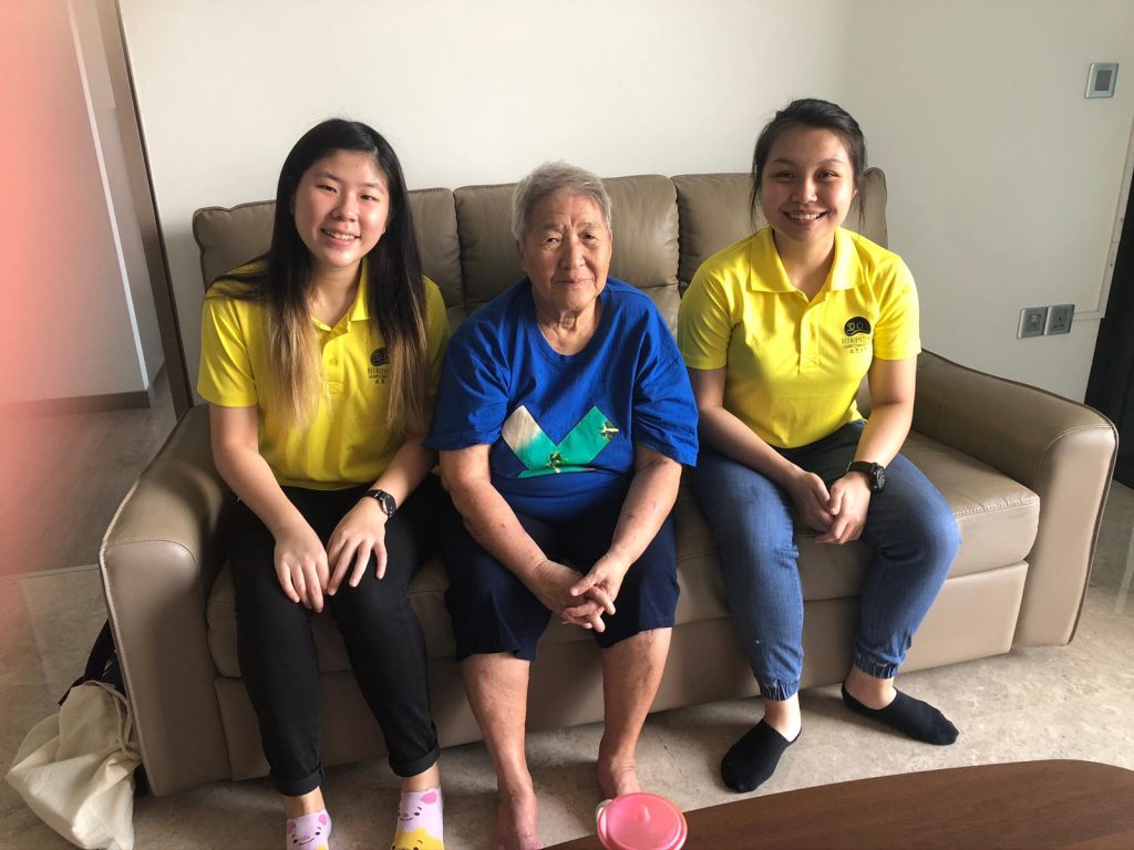 Jia Yi (left) and Christabel (right) spending time with a C3 Befriendee